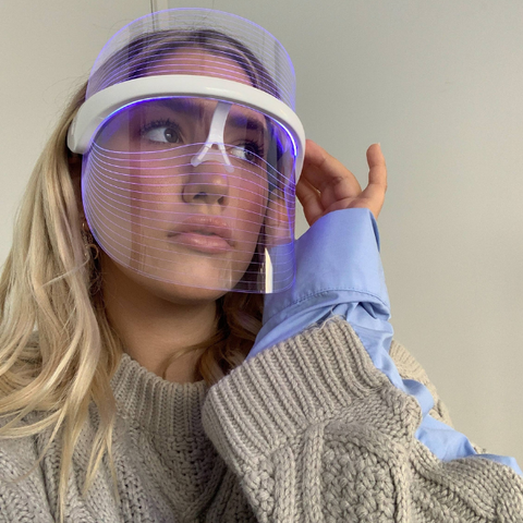 "A customer using blue, red & amber LED light therapy face masks for skin by Selfcare Social, Australia"